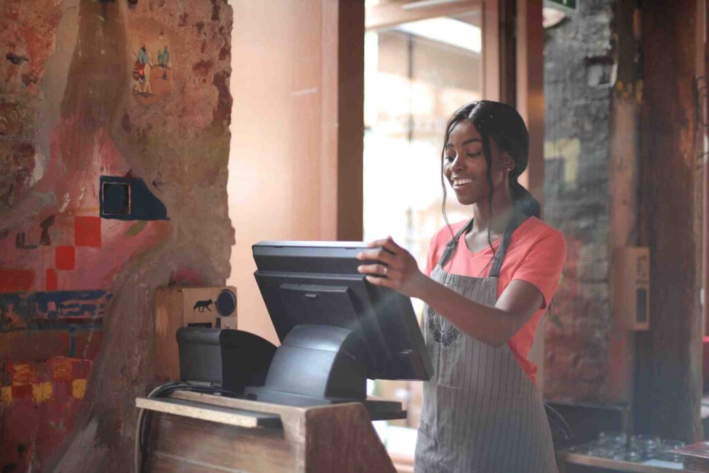 lady working on cash register