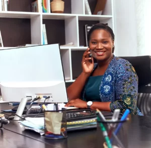 woman sitting behind an office desk running online businesses